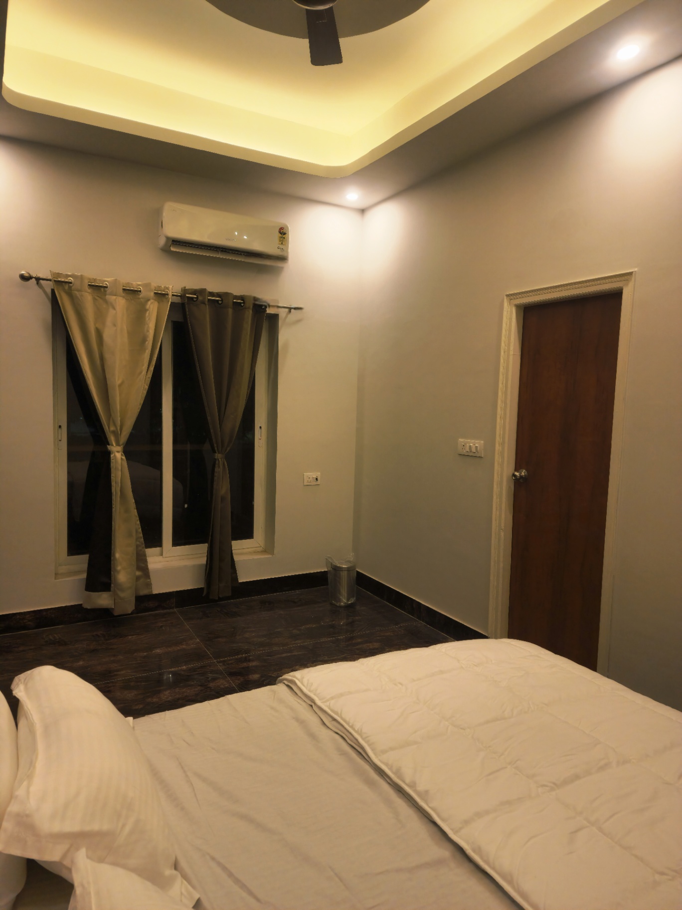 Spacious bedroom with AC, false ceiling and natural light